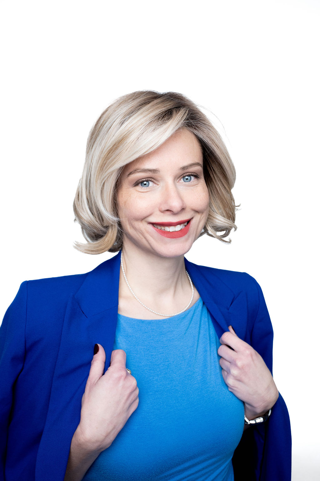 Kelly, blue jacket press headshot