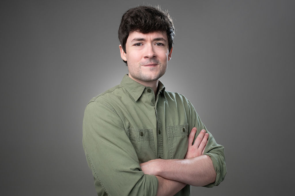 Jeffery, arms crossed environmental portrait